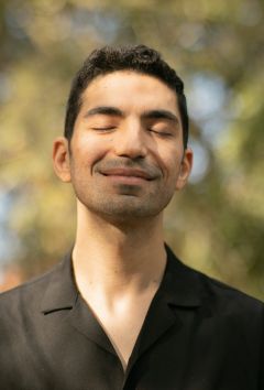 Man smiling with eyes closed