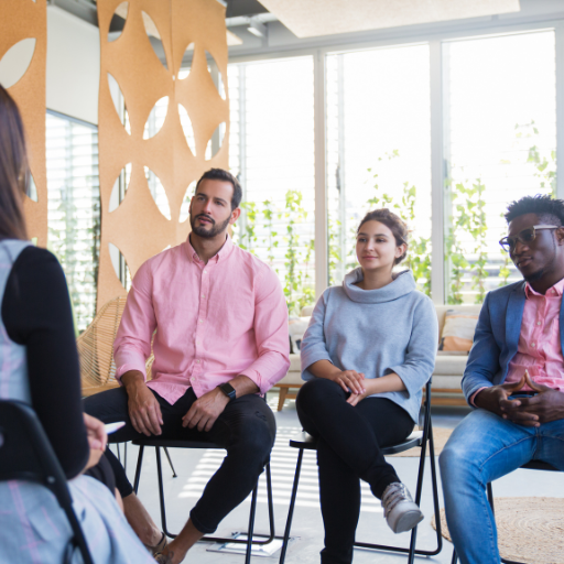 young people sitting circle having discussion