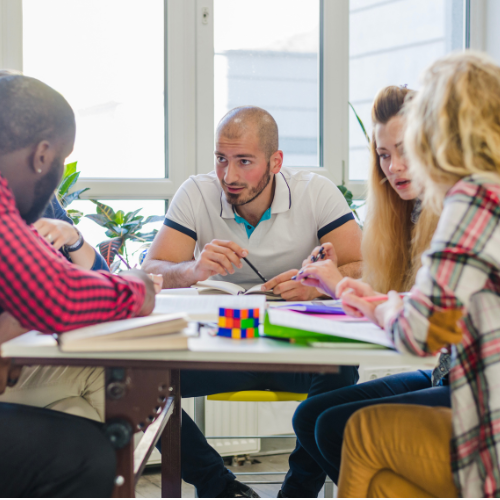 business consultant sharing knowledges with group colleagues