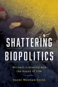 Shattering Biopolitics front cover: Black activist with microphone in die-in