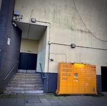 Amazon pick up point, Edinburgh, with a cabinet with yellow drawers