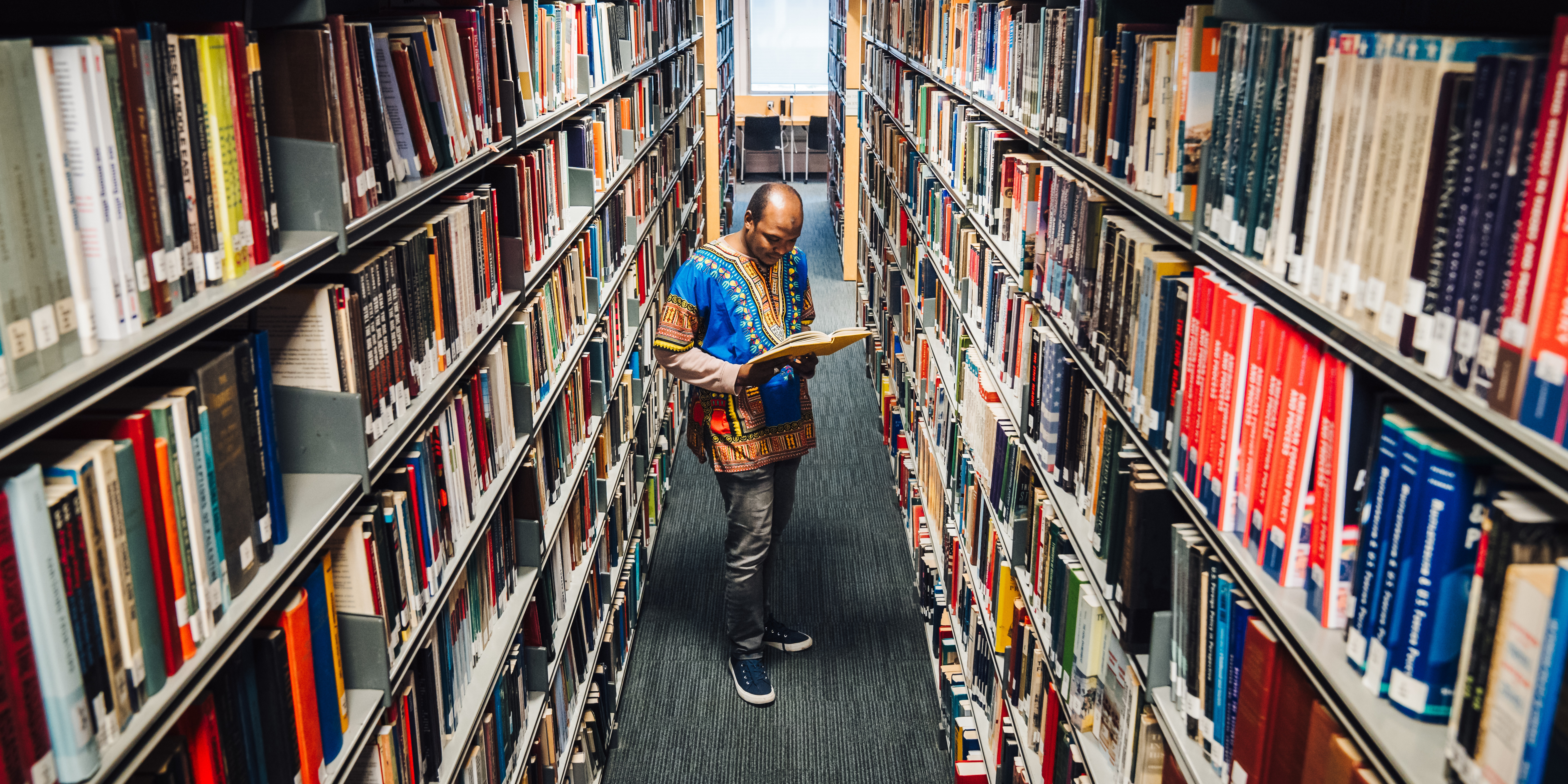 A man standing in the library