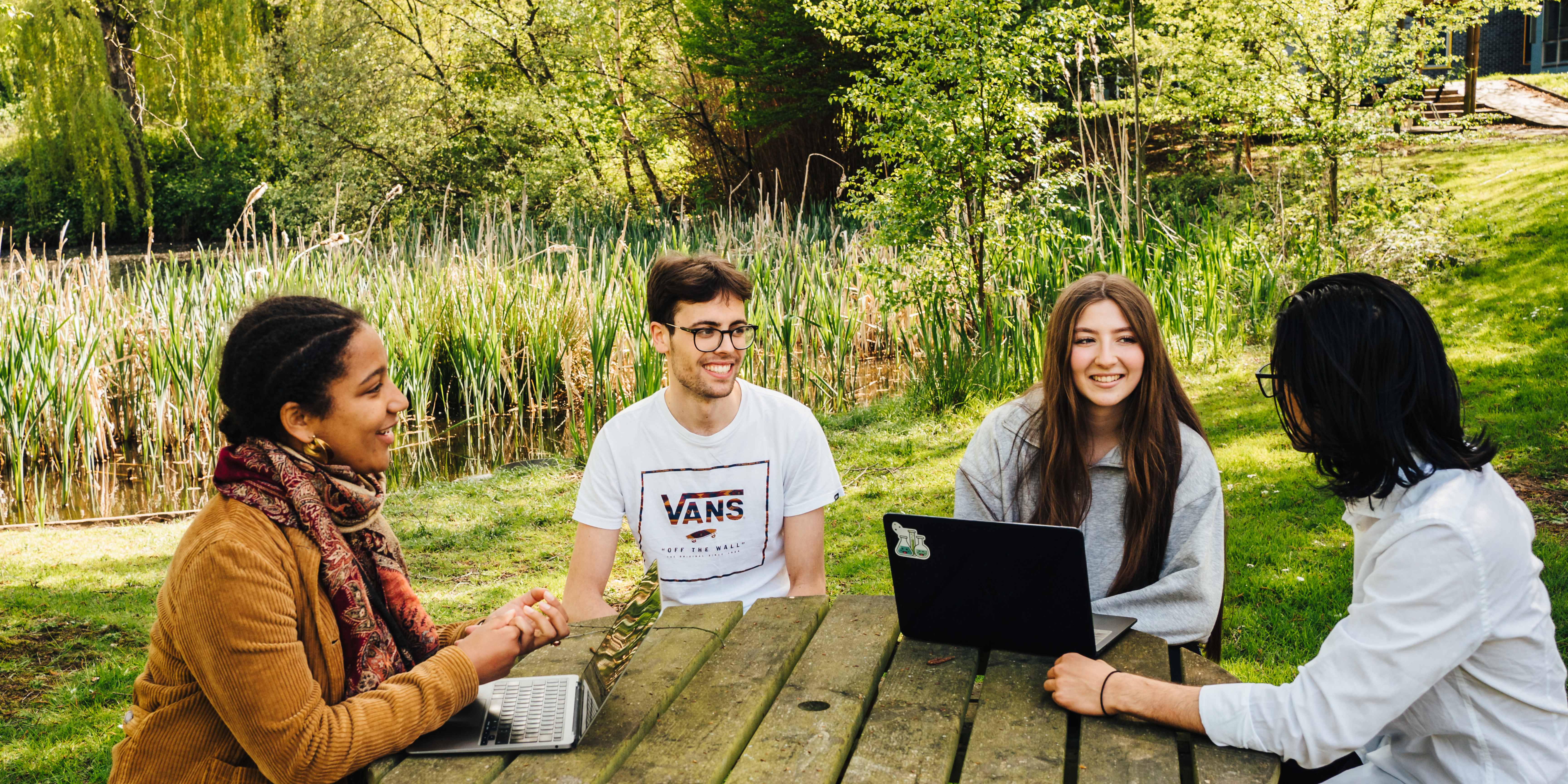 Group of students round a table