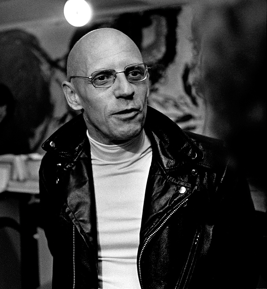 Michel Foucault in a leather jacket