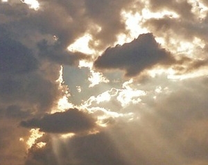 Sunlight shining through clouds