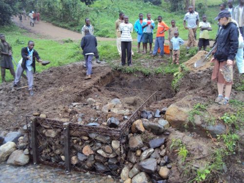 Figure 2: The Warwick team supervise the dam-building