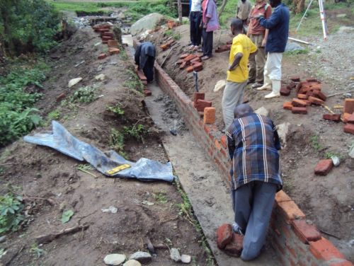 Figure 7: local builders constructing channel