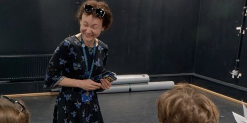 TEacher laughing with students