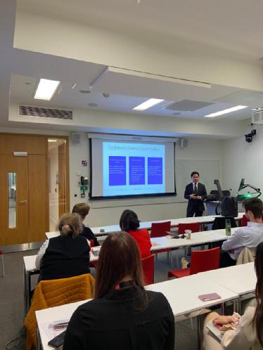 Justin presenting his research in LSE