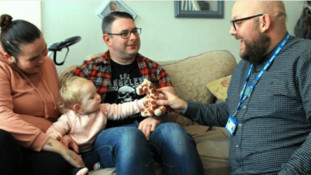 Family being visited by male