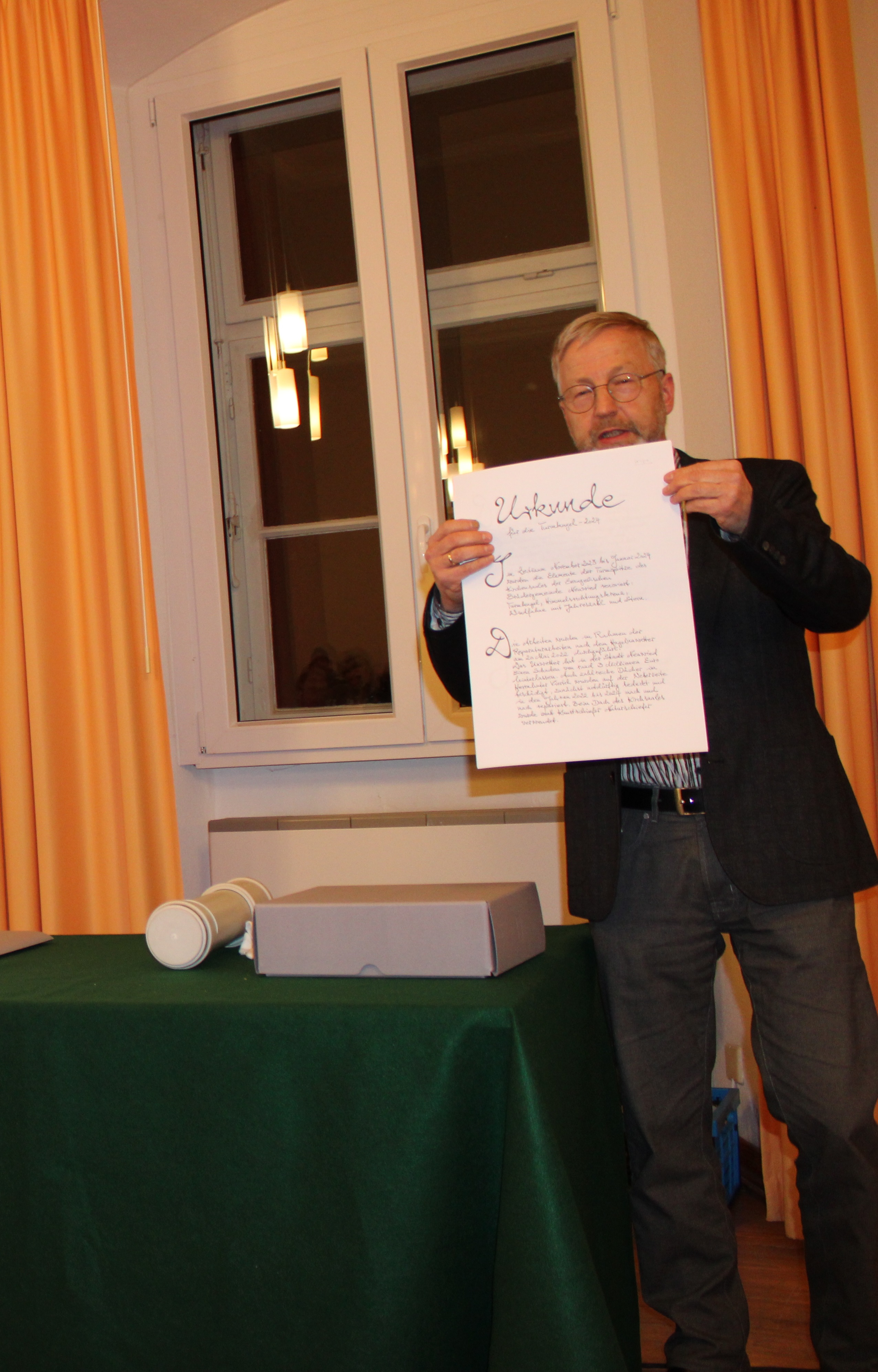 Christoph Huss with the 2024 tower capsule document