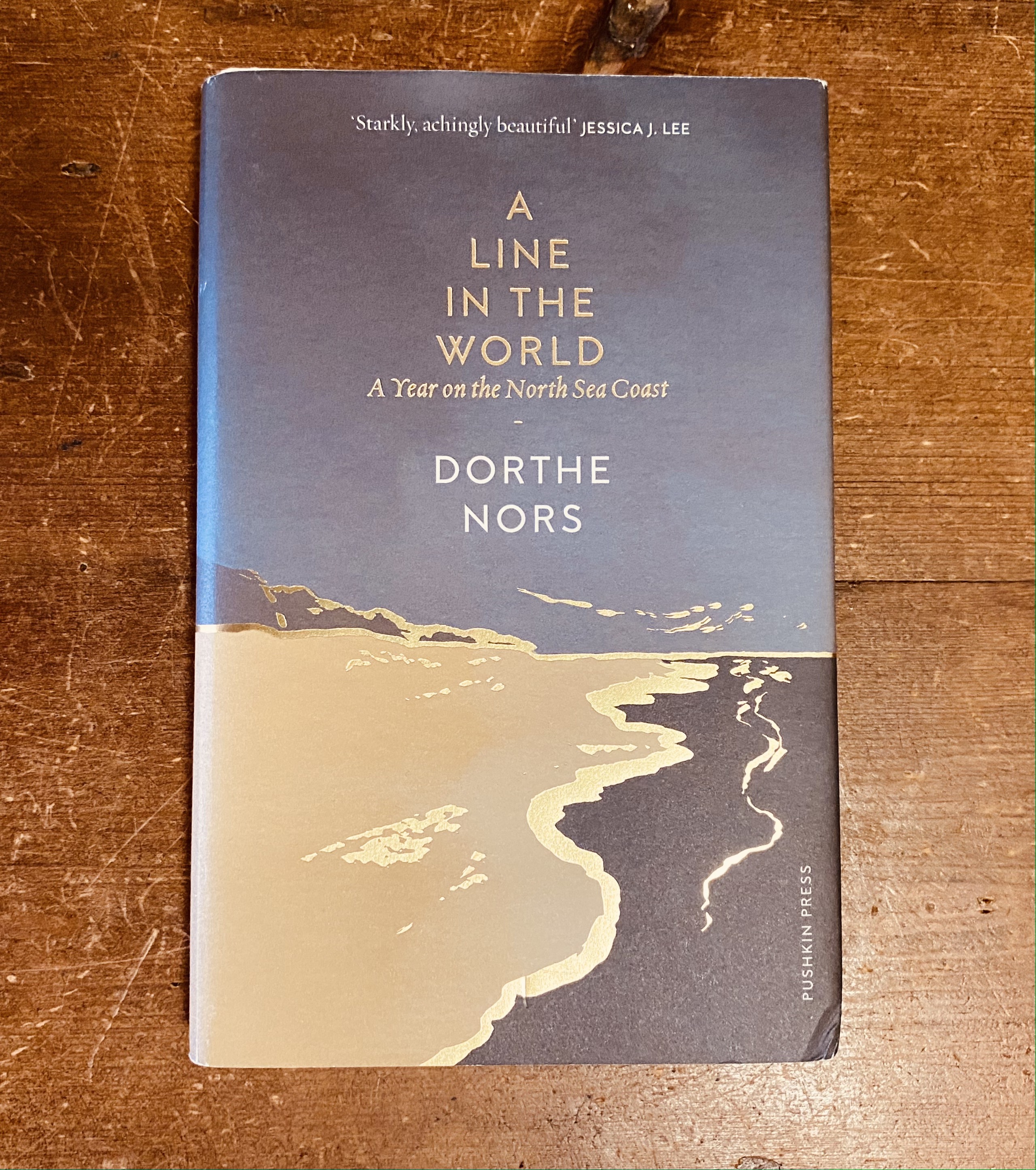 A photograph of the runner-up in the Warwick Prize for Women in Translation 2023, A Line in the World by Dorthe Nors, translated by Caroline Waight