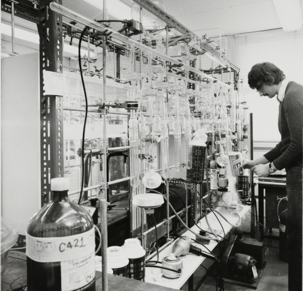 Scientists working with thermos flask 