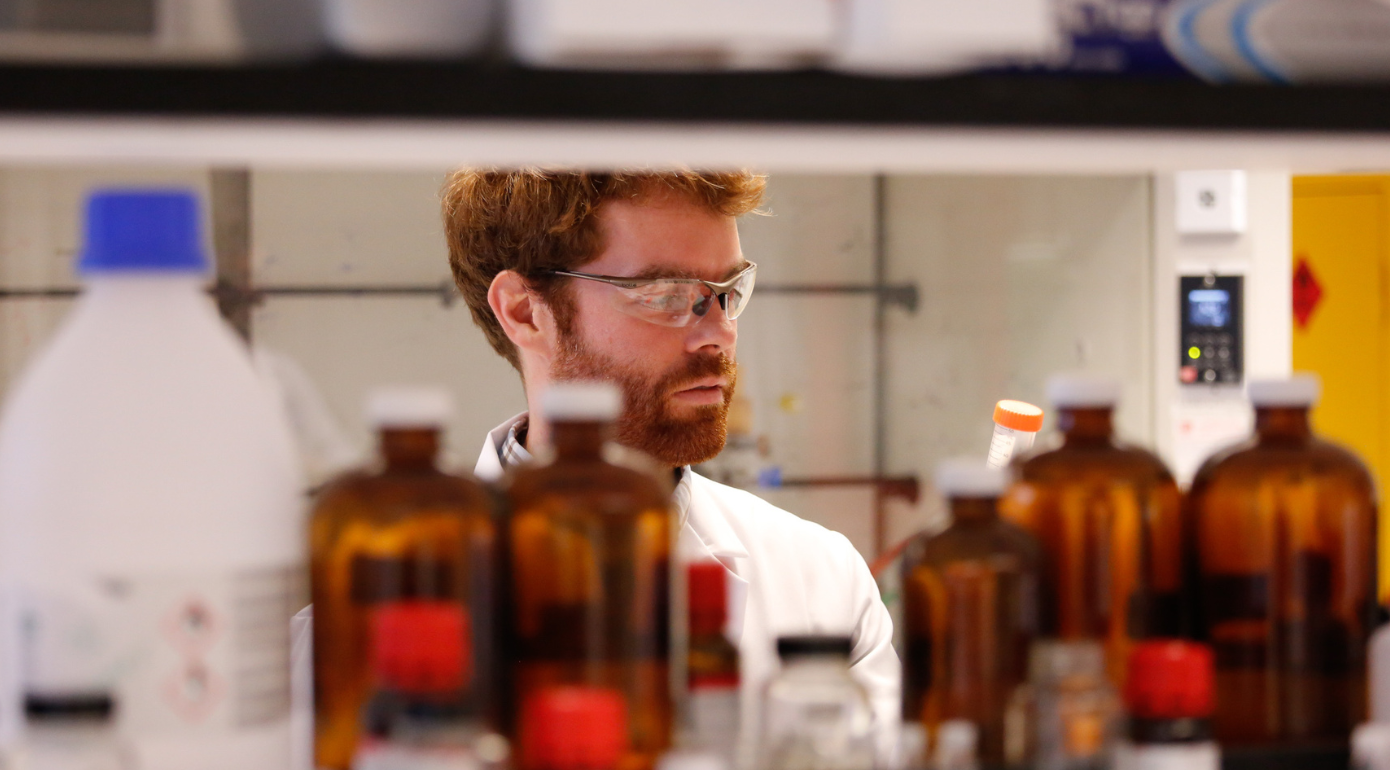 A stduent in a chemical store, browsing