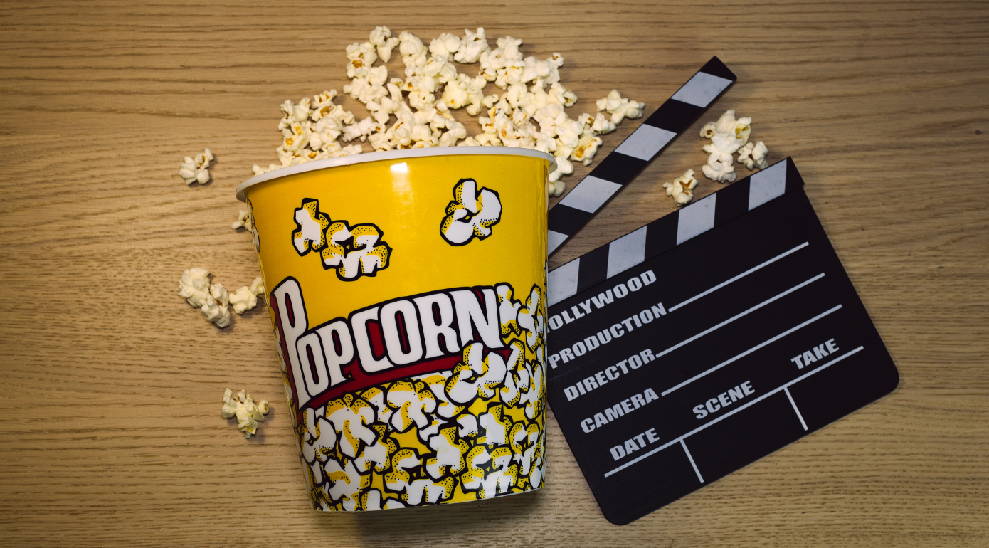 A bucket of popcorn and a film slate