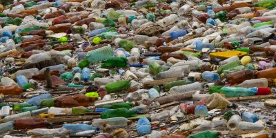 Plastic bottles floating on sea