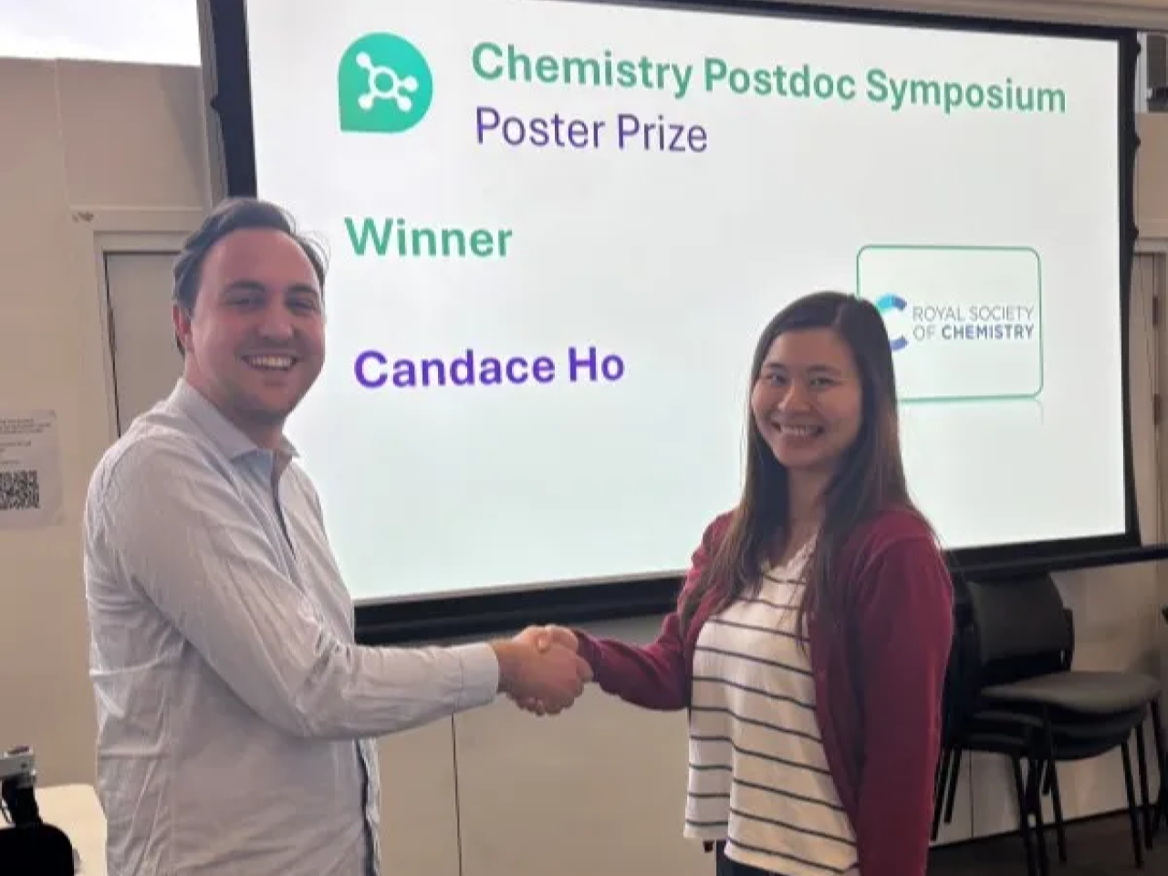 man and woman shaking hands