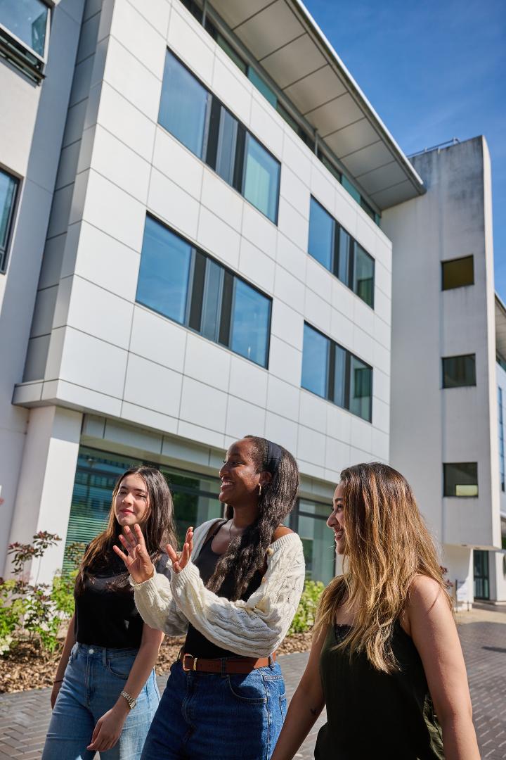 Students talking in front of DCS