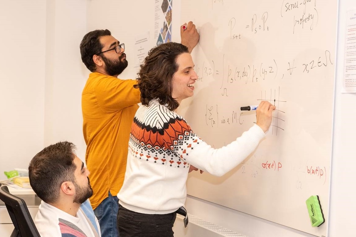 PhD students working