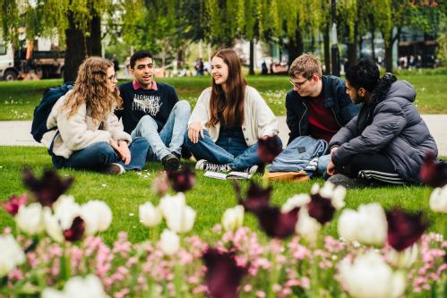 students sitting on campus