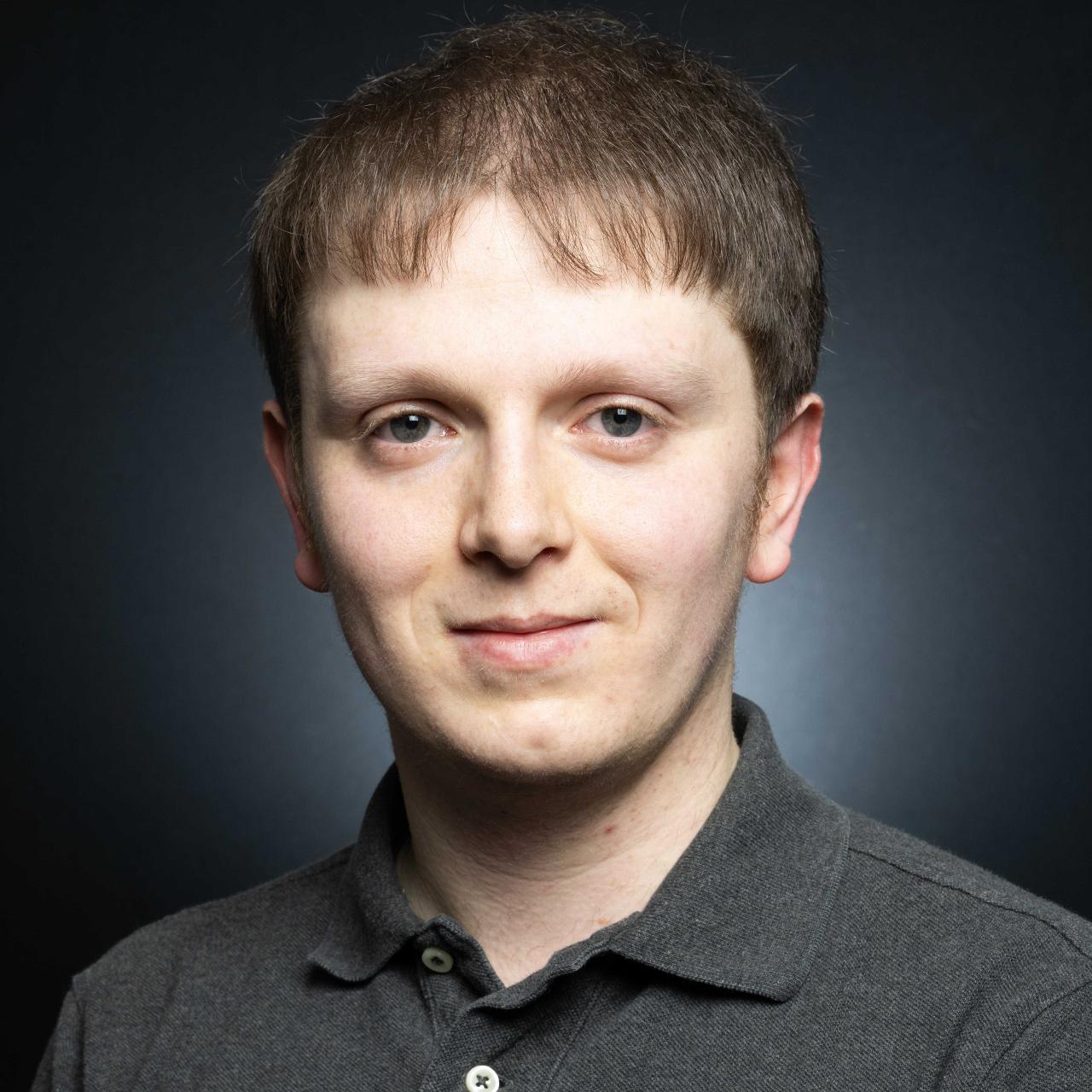 Portrait of Dr Tom Sykes