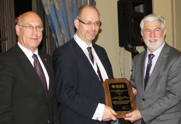 Professor Christopher James presented with award