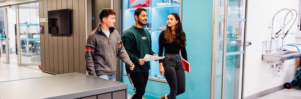 Students walking through the department 