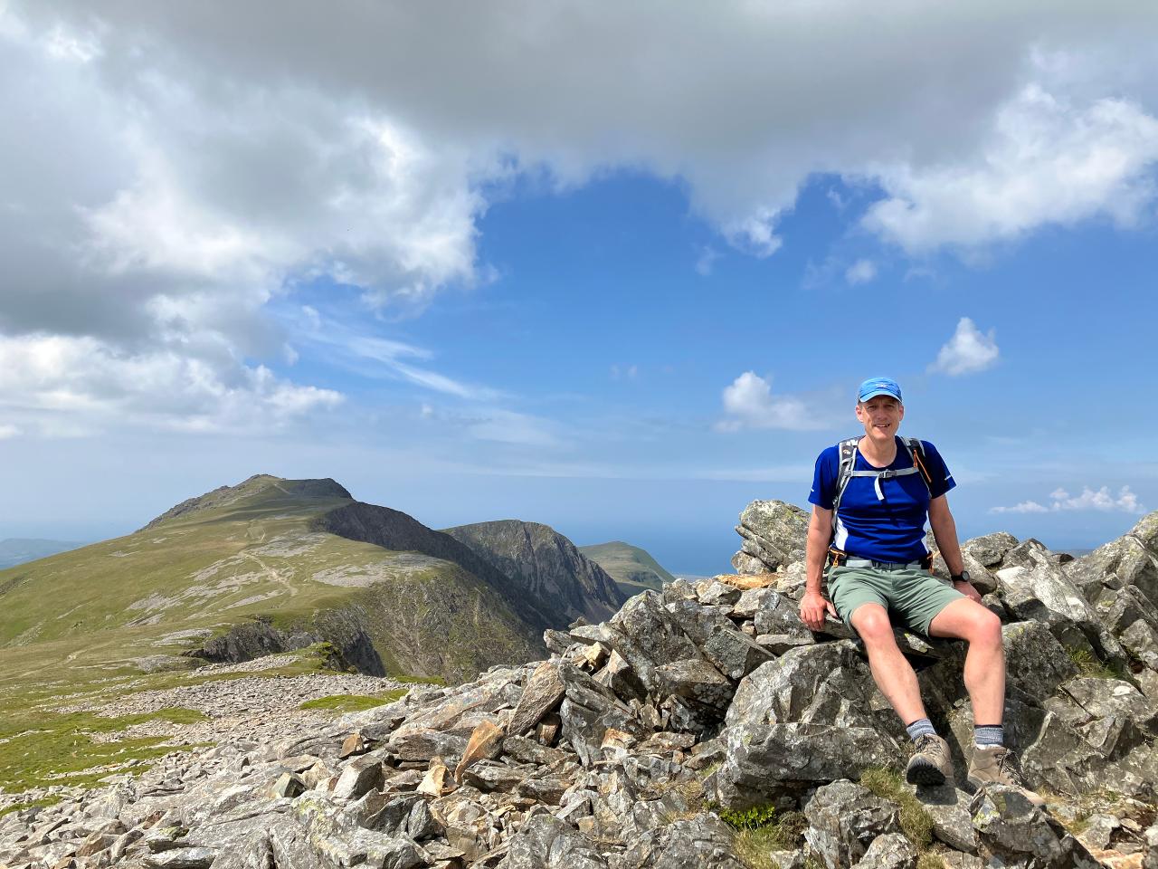Matt Keeling on a mountain on a sunny day