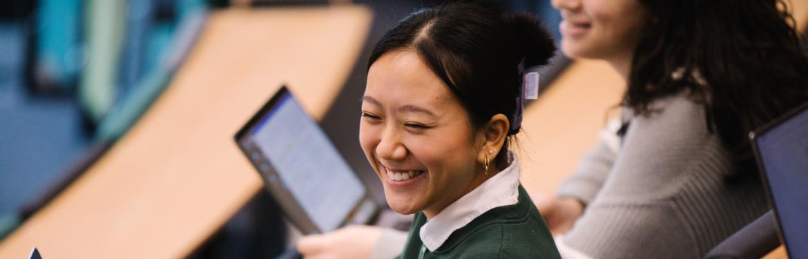 Smiling student in a lecture