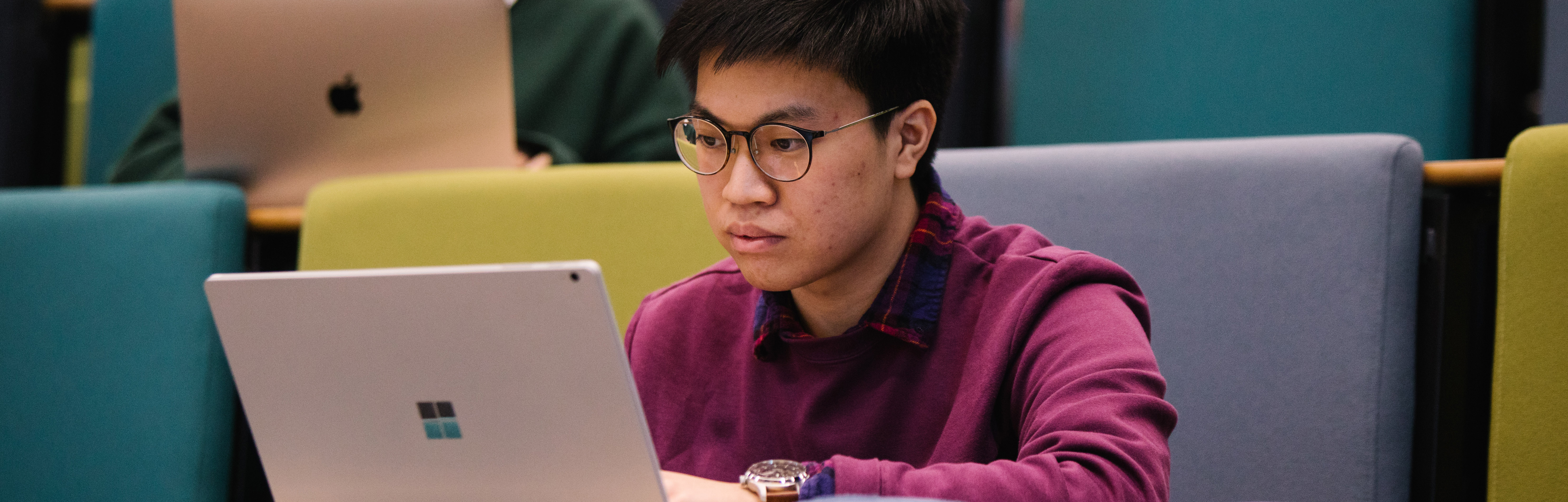 Male student at laptop