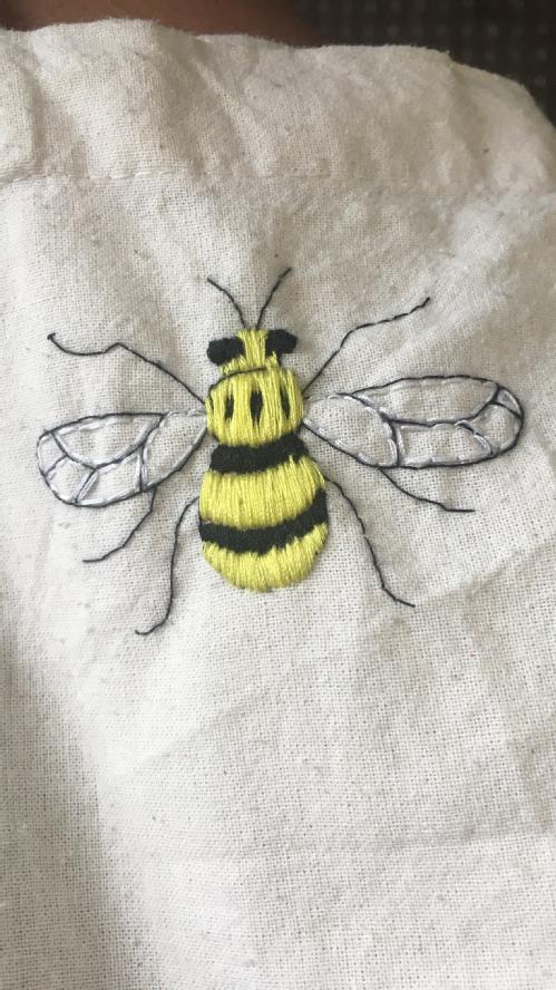 Jack Bara's embroidered bee