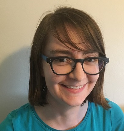 Headshot of Laura smiling