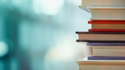 Resources - image shows stack of books