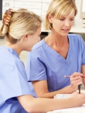 two nurses talking