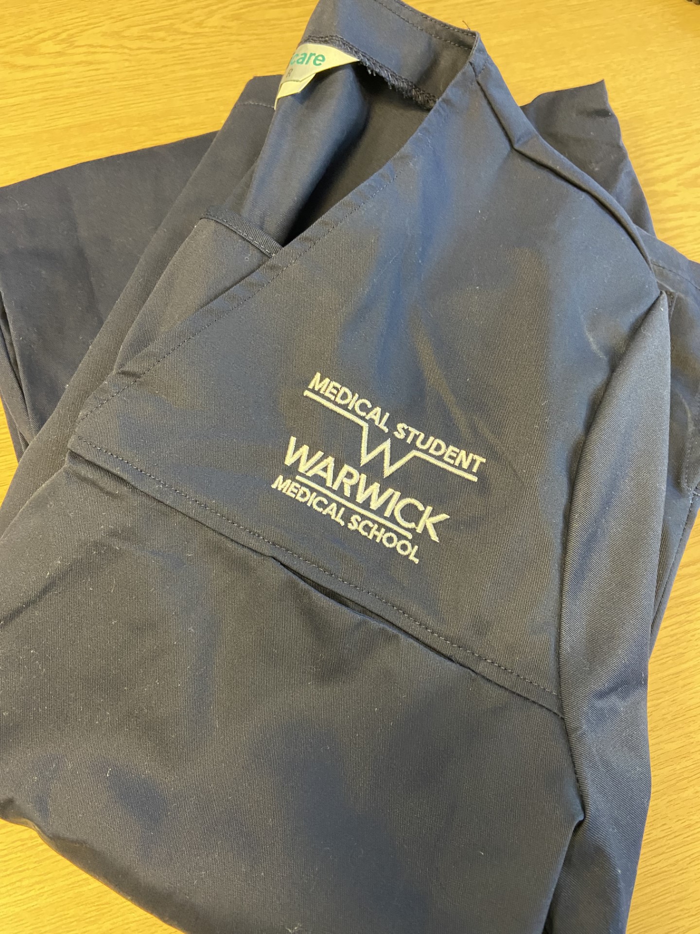 a photo Warwick Medical school medical student scrubs