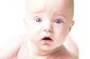 Wide eyed infant M