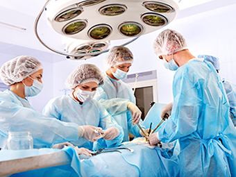 Surgical team operating