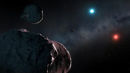 Artist’s impression of the old white dwarfs WDJ2147-4035 and WDJ1922+0233 surrounded by orbiting planetary debris, which will accrete onto the stars and pollute their atmospheres. WDJ2147-4035 is extremely red and dim, while WDJ1922+0233 is unusually blue. Credit: University of Warwick/Mark Garlick