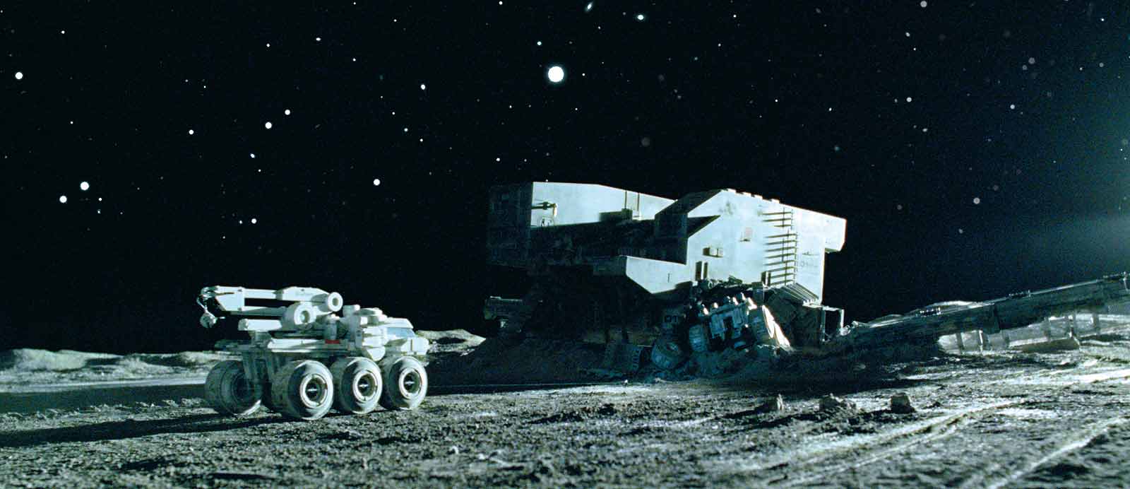 Still from Moon (2009) showing ground vehicles