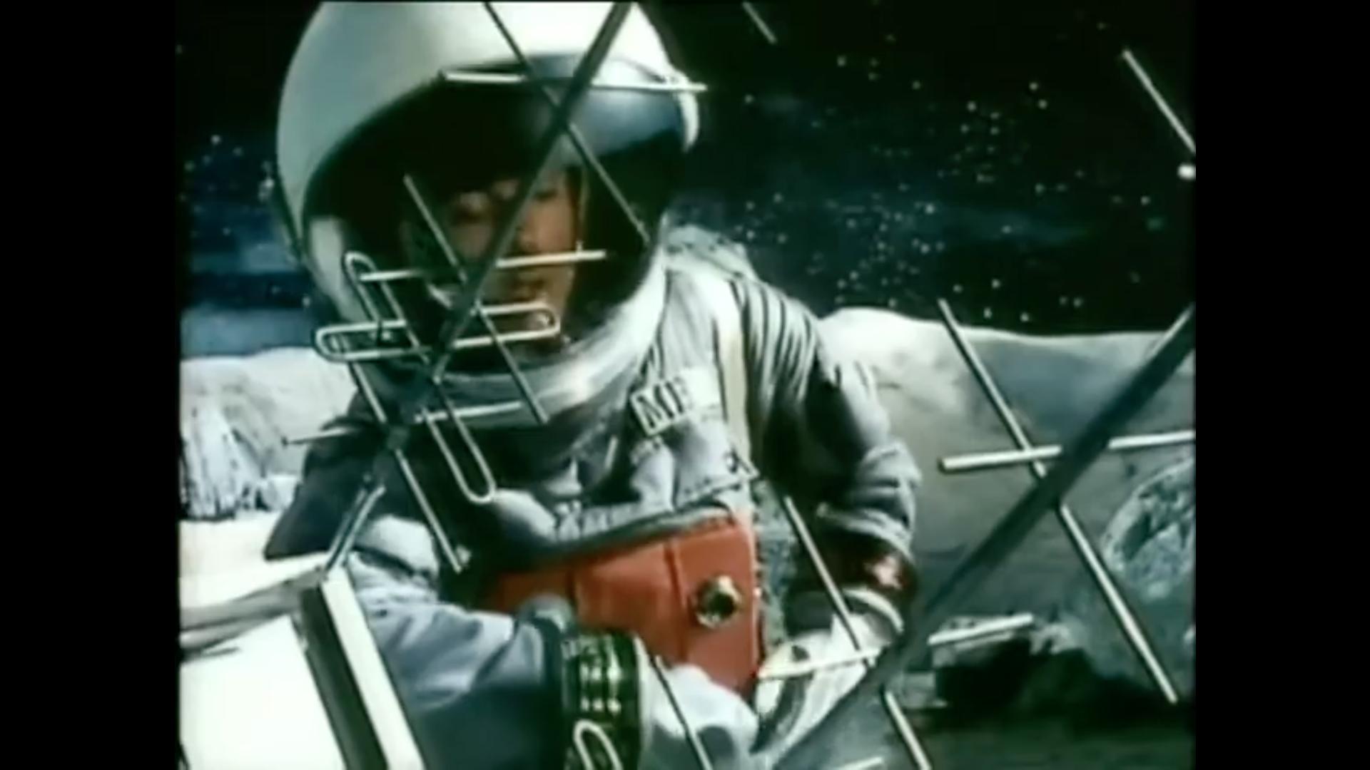 A scientist adjusts a radio antenna in an episode of Moonbase 3. source: imdb