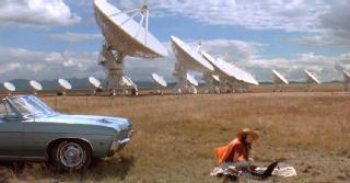 The Very Large Array as seen in the film Contact, with actress Jodi Foster in the foreground.