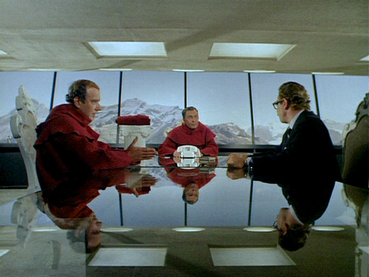 A secret cabal of scientists plotting in its secret base in The Man from UNCLE episode "The Seven Wonders of the World Affair". image source: youtube