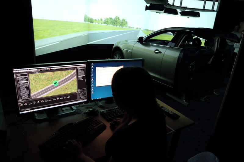 Driving simulator with computers showing data 