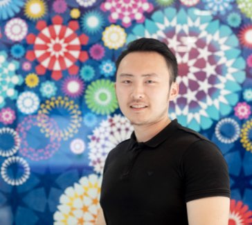 student with flower background