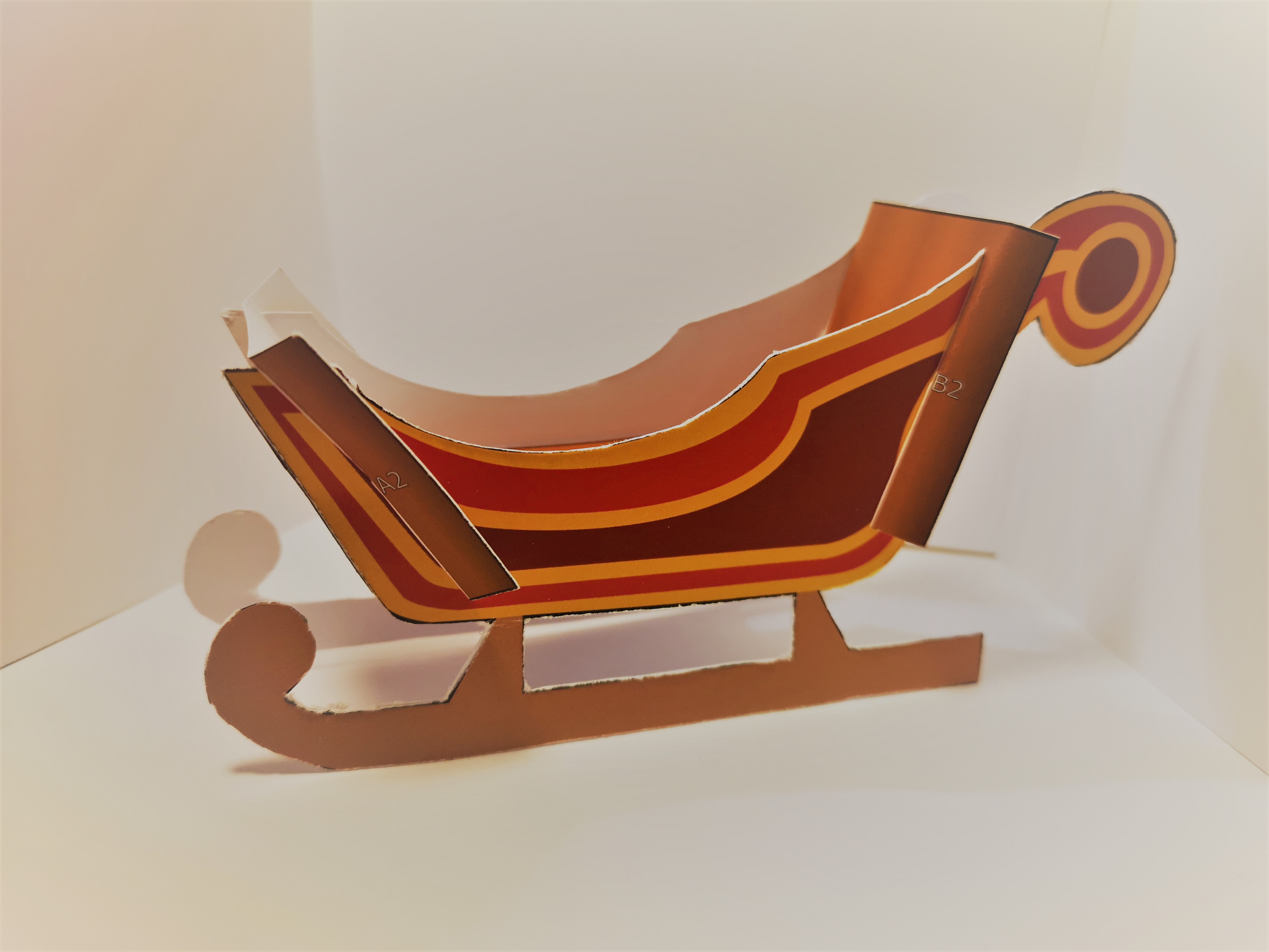 a sleigh made from paper
