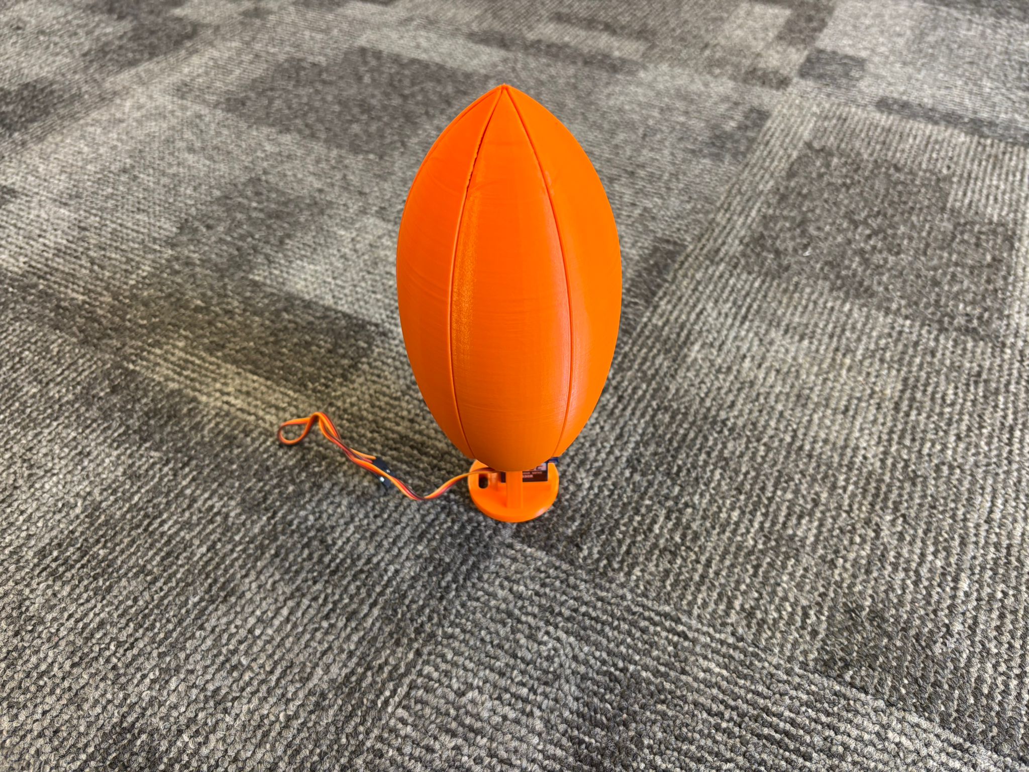 the 3d printed mechanical flower in its closed state