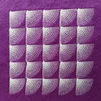 Quarters pattern stitched onto felt