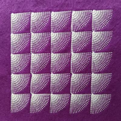Stitched image of the quarters pattern on felt