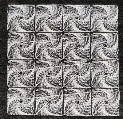 shows what the square grid pattern looks like when stitched on felt