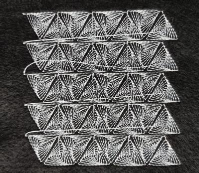 Triangle grid pattern stitched onto felt